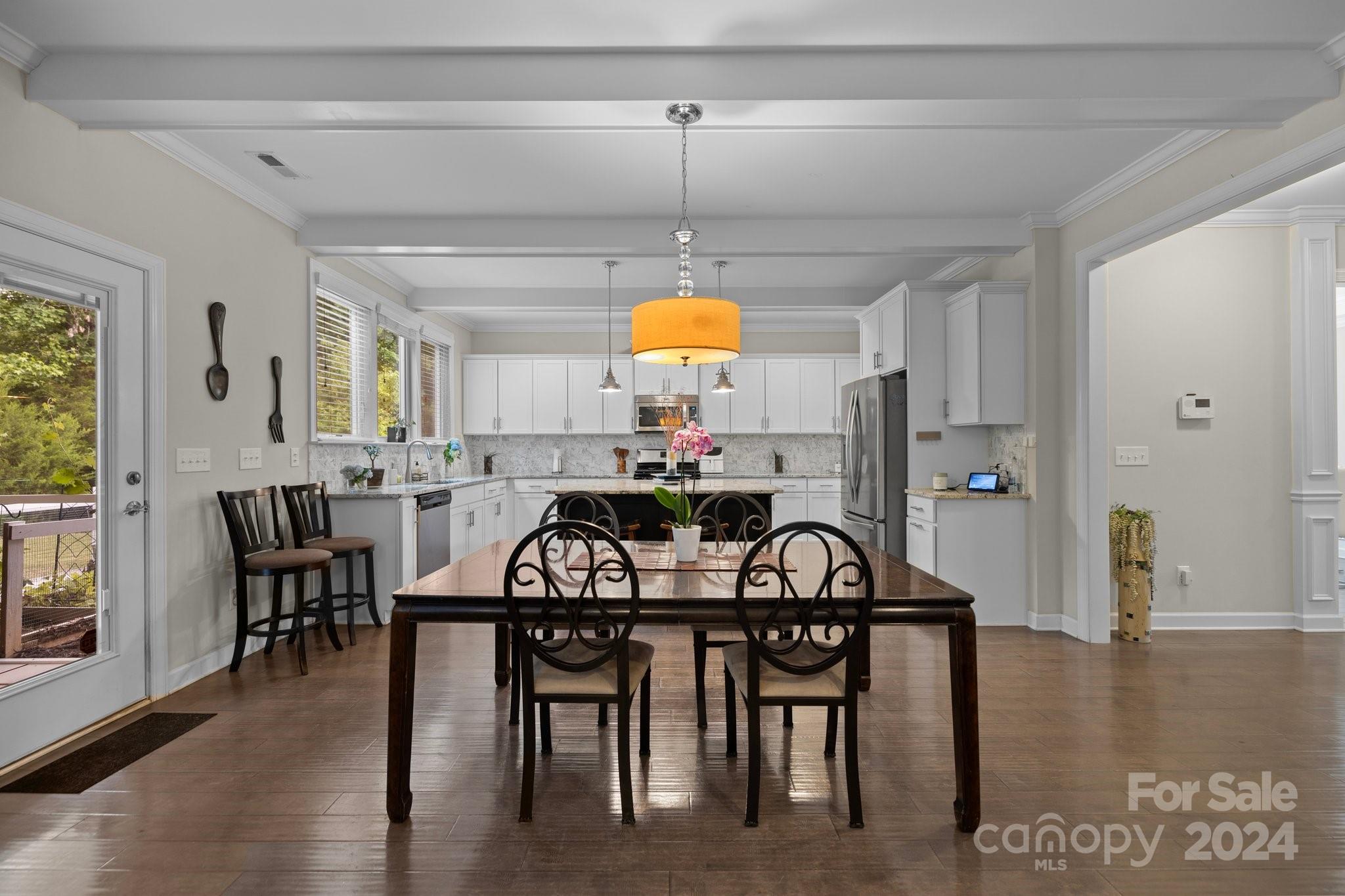 2061 Fuschia Court Fort Mill, SC 29708 - Photo 5 of 45 a view of a dining room with furniture window and wooden floor
