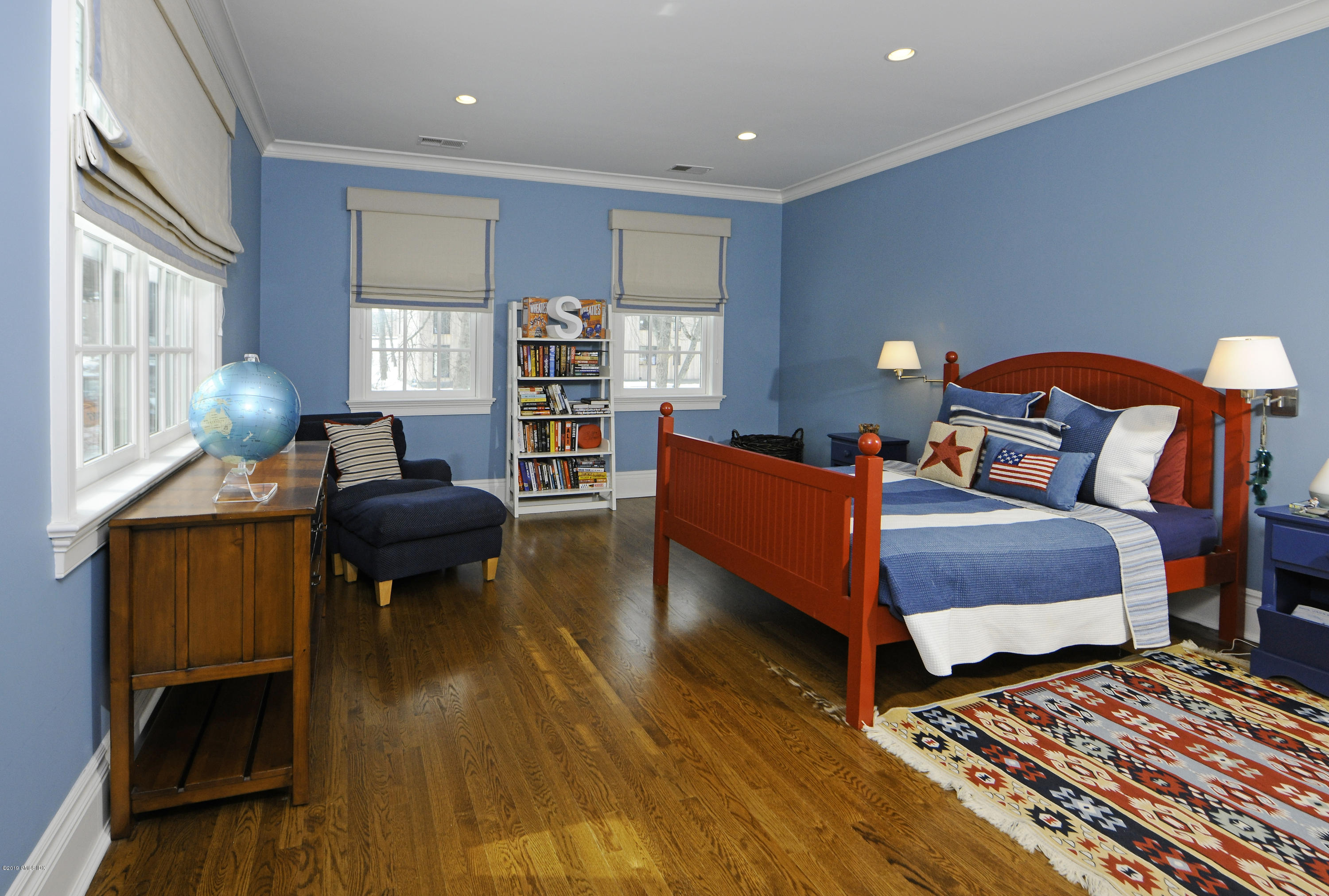 35 Beechcroft Road Greenwich, CT 06830 - Photo 13 of 21 a bedroom with furniture and a wooden floor