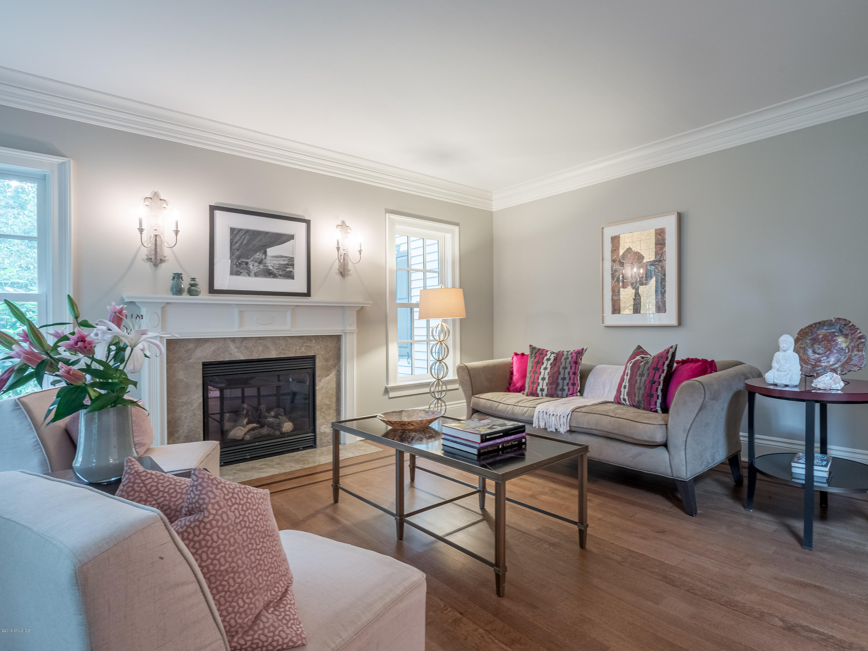 35 Beechcroft Road Greenwich, CT 06830 - Photo 3 of 21 a living room with furniture and a fireplace