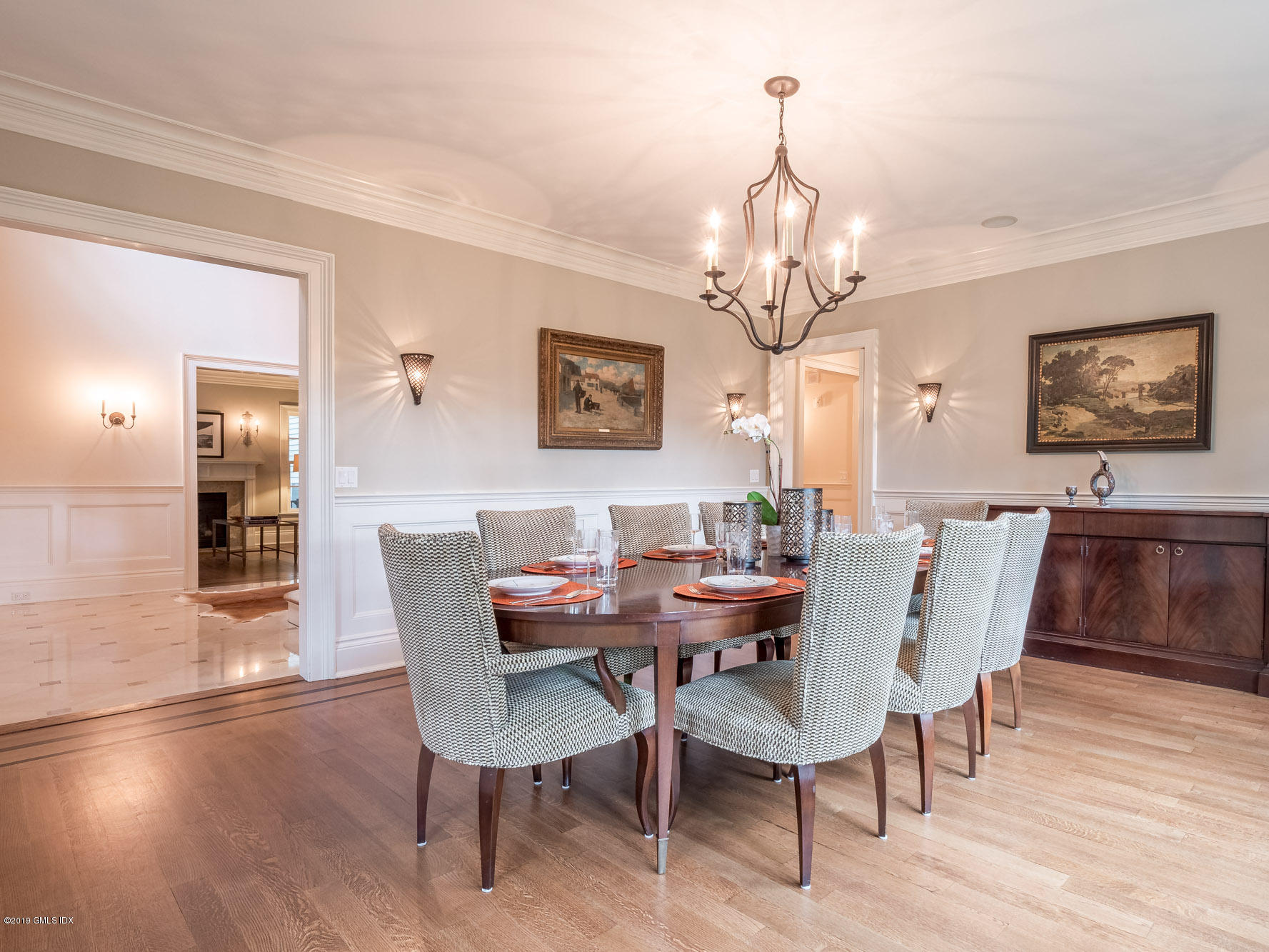 35 Beechcroft Road Greenwich, CT 06830 - Photo 4 of 21 a view of a dining room with furniture wooden floor and a chandelier