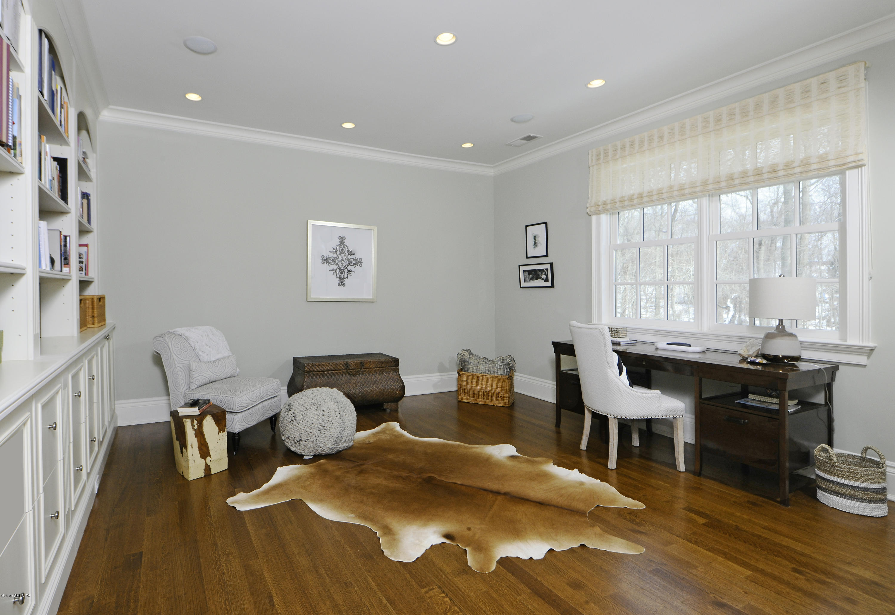 35 Beechcroft Road Greenwich, CT 06830 - Photo 10 of 21 a view of a dining room with furniture window and wooden floor