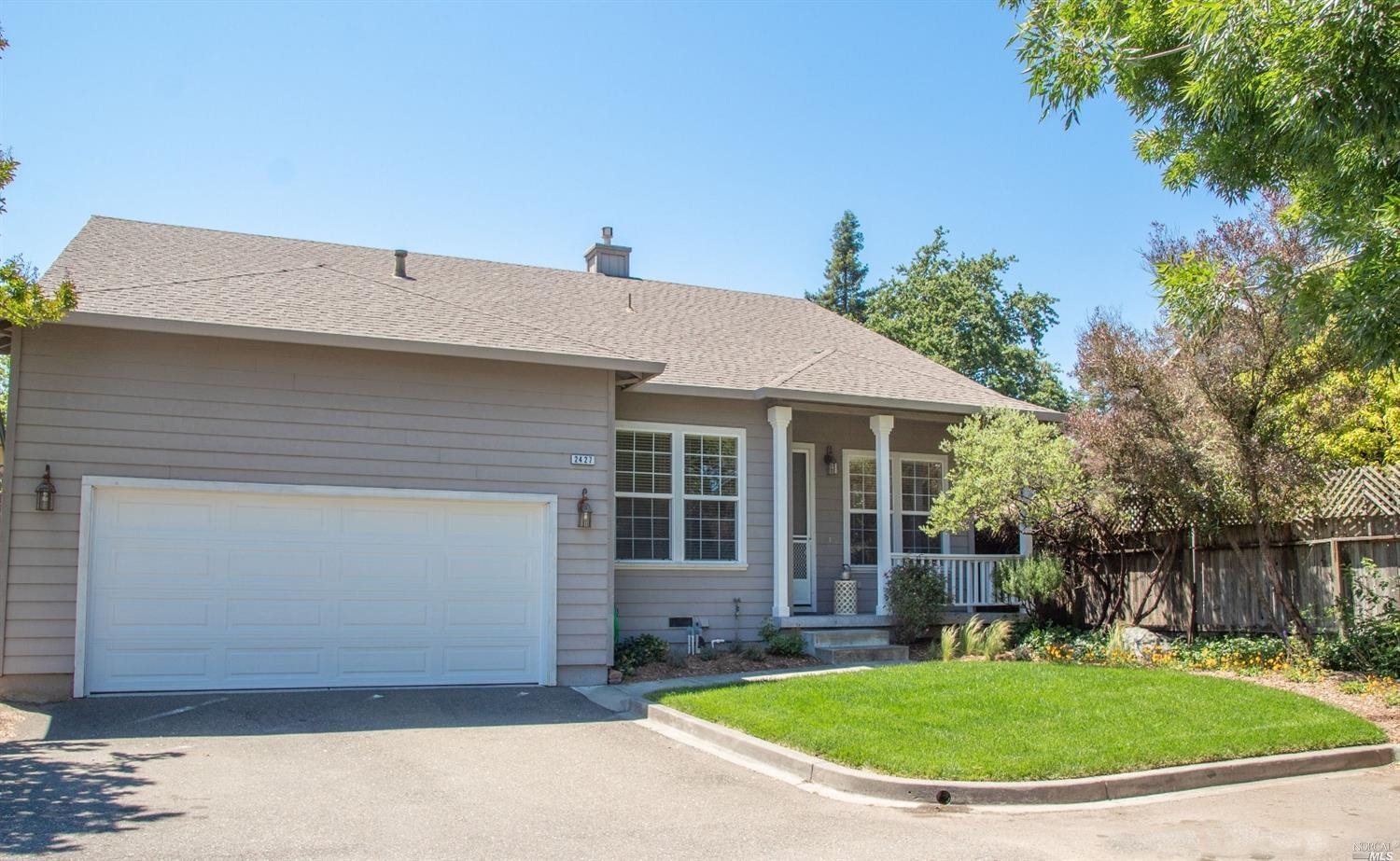 2427 Guerneville Road Santa Rosa, CA 95403 - Photo 1 of 1 a view of a house with a backyard