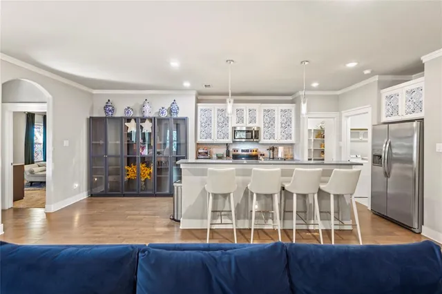 a view of a living room and kitchen view