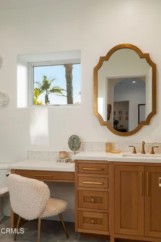 a view of swimming pool with outdoor seating and plants