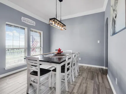 a bathroom with a sink and a window