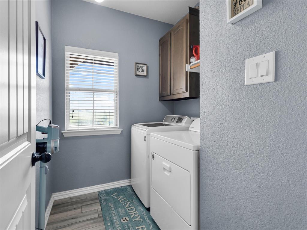 128 County Road 4430 Decatur, TX 76234 - Photo 16 of 34 a bathroom with a sink and a window