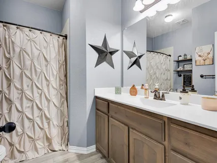 an aerial view of a house with outdoor space