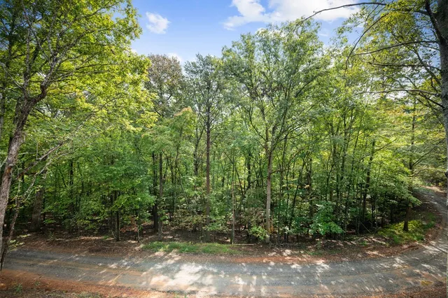 a view of outdoor space with porch and wooden floor