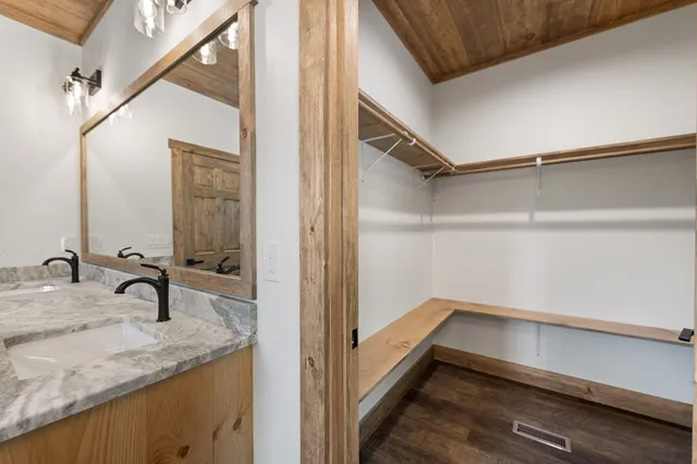 a view of an entryway with wooden floor