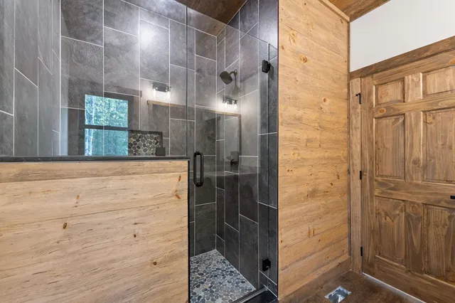 a white toilet sitting next to a bathroom sink