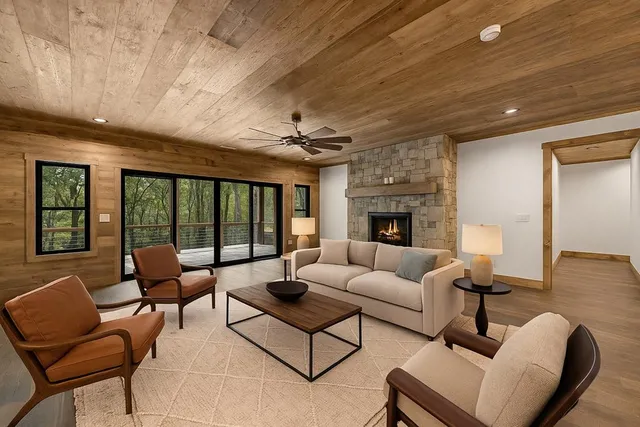 a spacious bedroom with a large bed and a couch