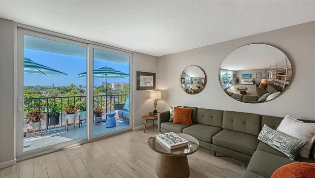 a view of a balcony with chairs