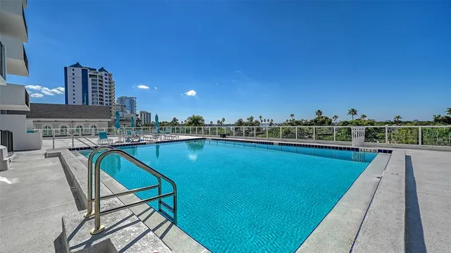 a view of a swimming pool and a terrace