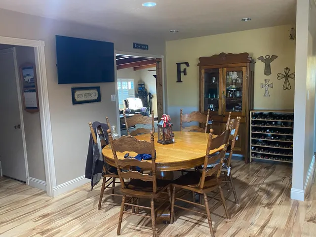 a view of a dining room with furniture