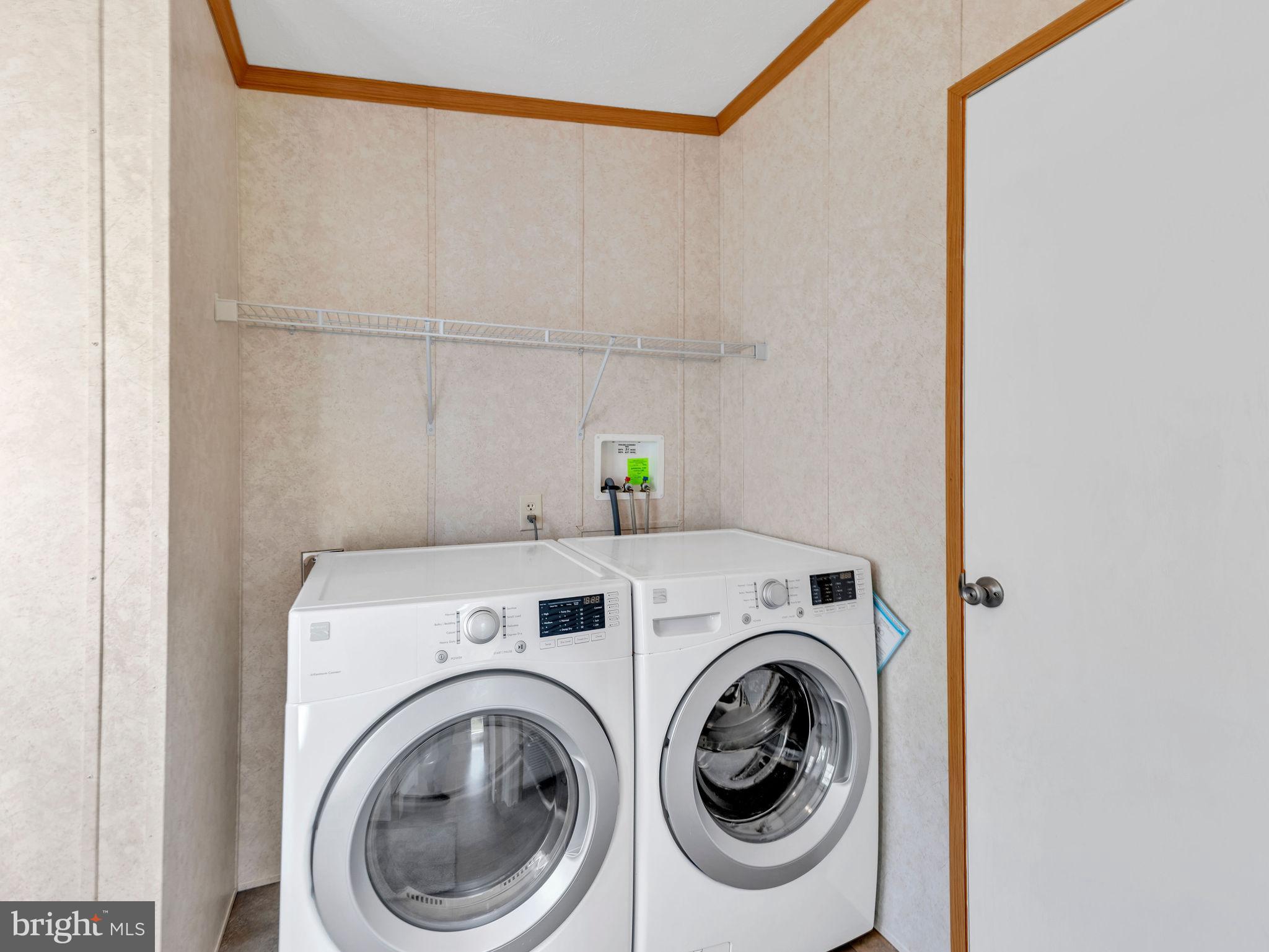 9811 Peerless Road Bishopville, MD 21813 - Photo 14 of 66 a utility room with dryer and washer
