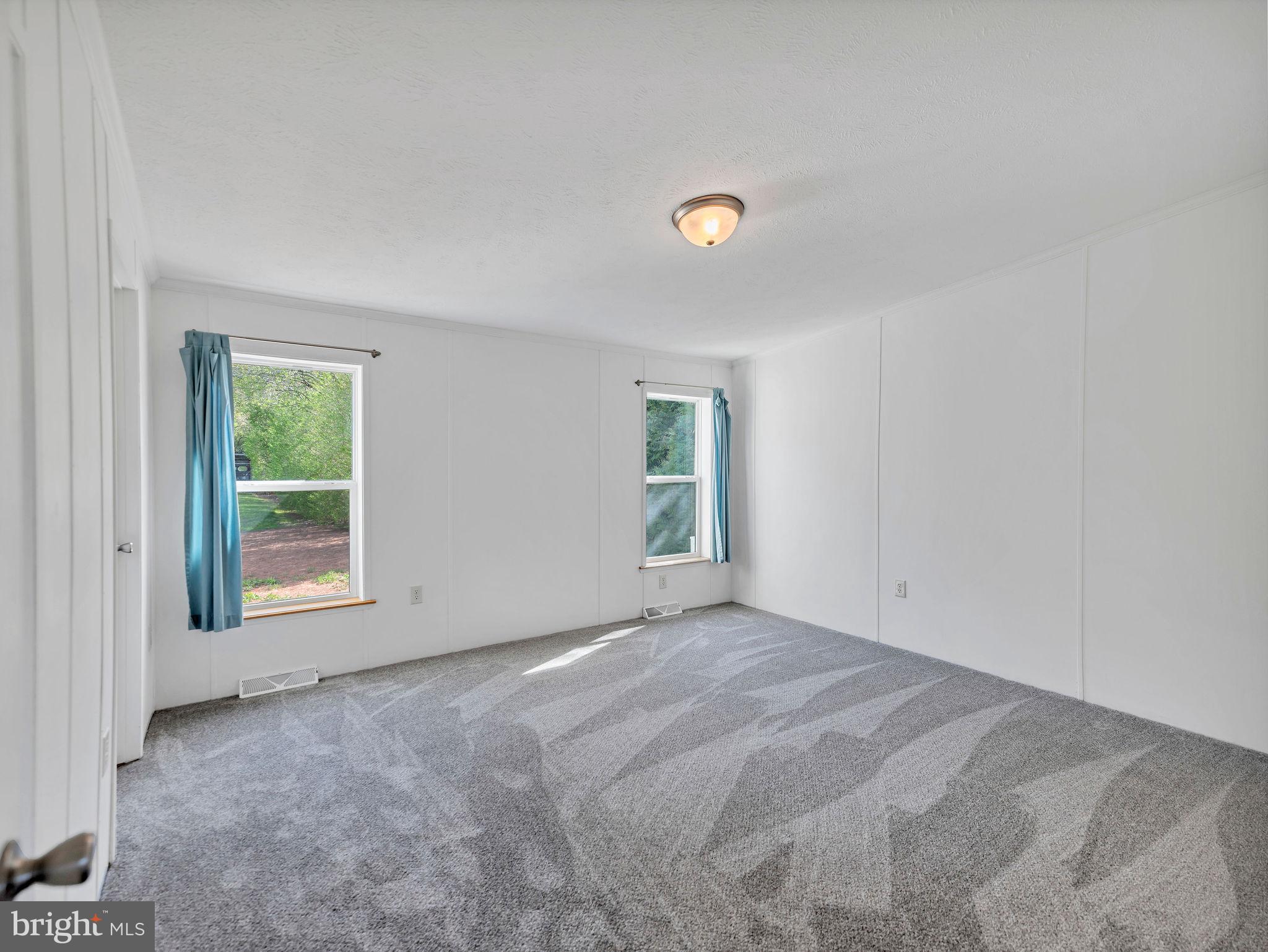 9811 Peerless Road Bishopville, MD 21813 - Photo 24 of 66 an empty room with a window