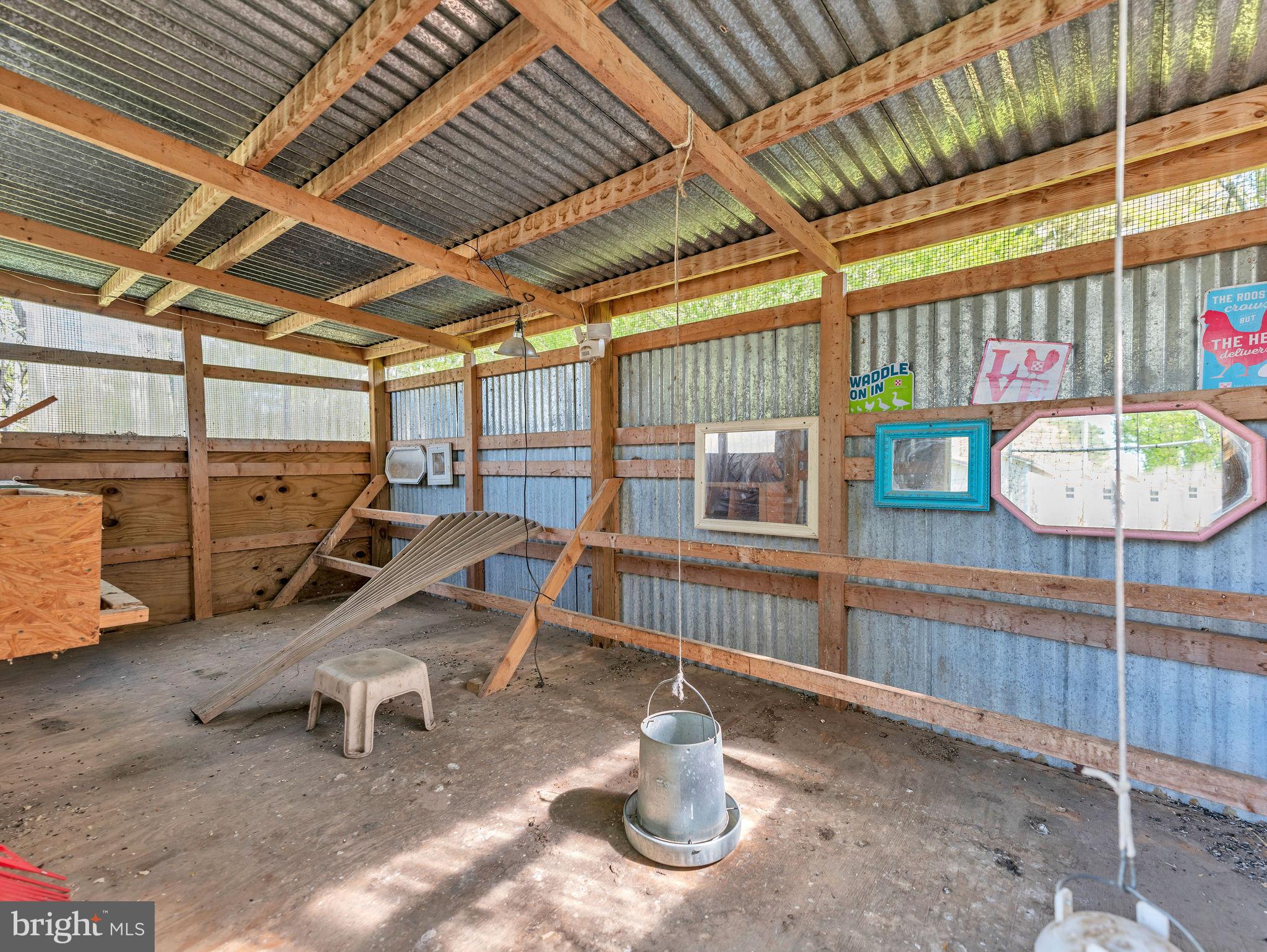 9811 Peerless Road Bishopville, MD 21813 - Photo 39 of 66 a view of a room with wooden floor