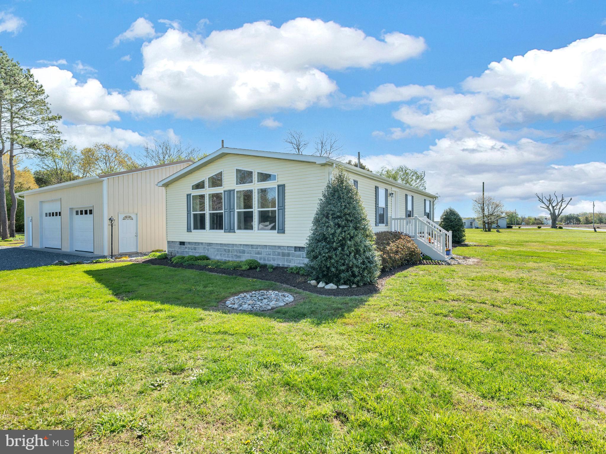 9811 Peerless Road Bishopville, MD 21813 - Photo 45 of 66 a front view of a house with garden