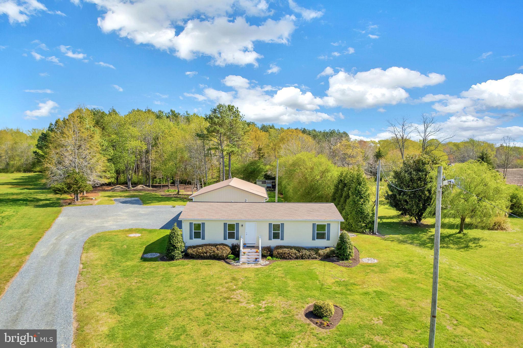 9811 Peerless Road Bishopville, MD 21813 - Photo 5 of 66 a view of a house with swimming pool and sitting area