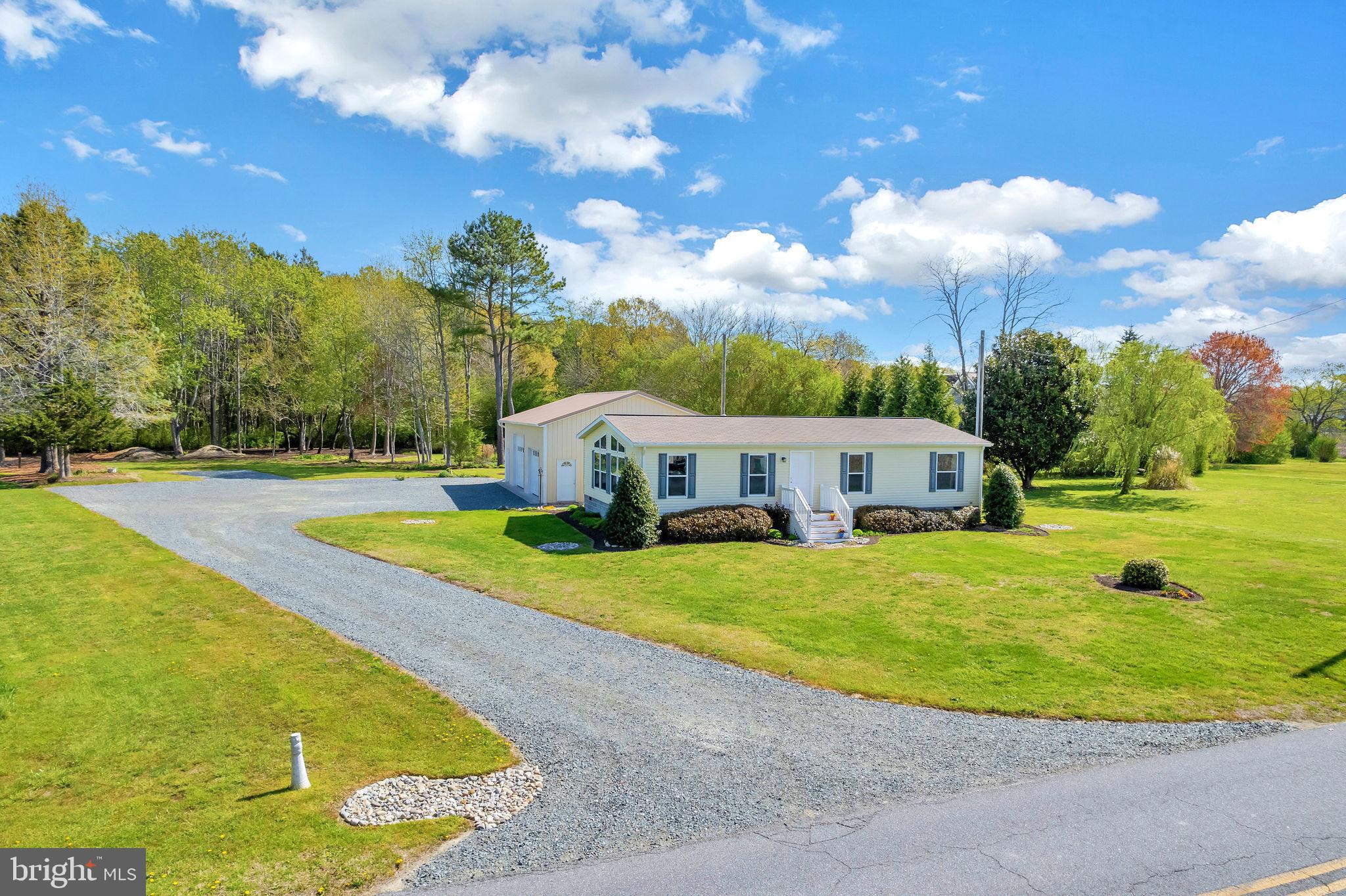 9811 Peerless Road Bishopville, MD 21813 - Photo 52 of 66 a view of a house with a big yard