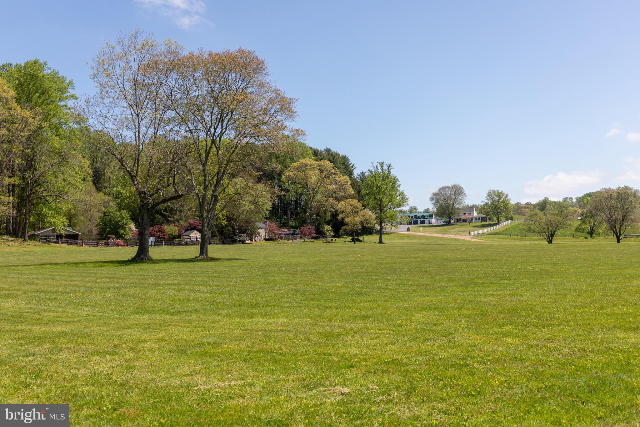 2310 Putnam Road Forest Hill, MD 21050 - Photo 13 of 90 Sprawling green landscape under blue skies.