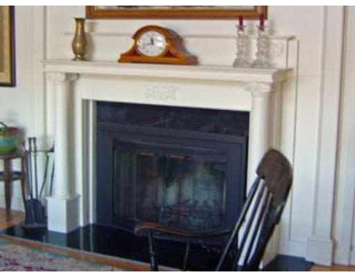 419 River Road Barnstable, MA 02648 - Photo 5 of 10 a closeup of a fireplace