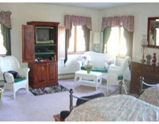 419 River Road Barnstable, MA 02648 - Photo 7 of 10 a living room with furniture and a window