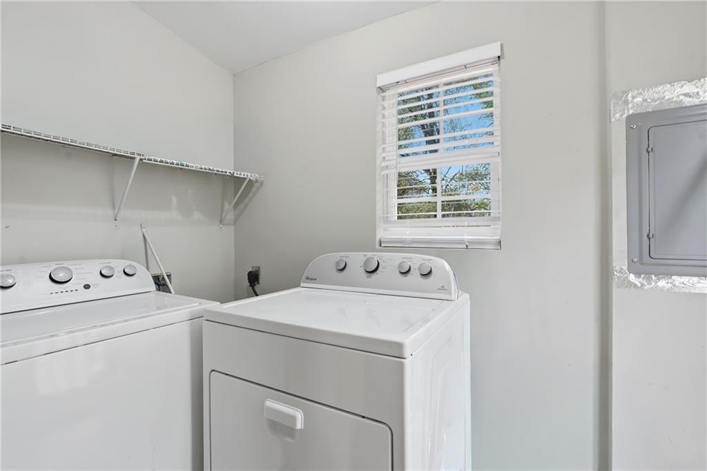 1295 Double Bridges Road Winder, GA 30680 - Photo 18 of 57 a utility room with dryer and washer