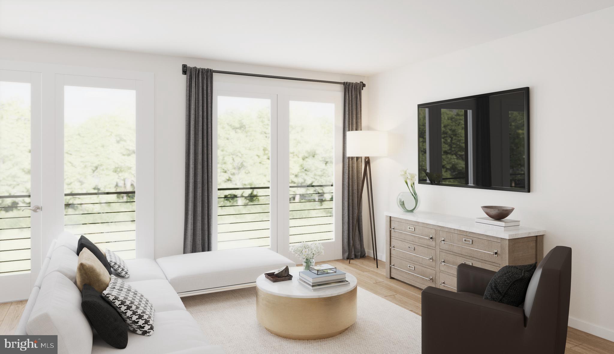 1669 Bandit Loop, Unit 305A Reston, VA 20190 - Photo 4 of 30 a living room with furniture and a window