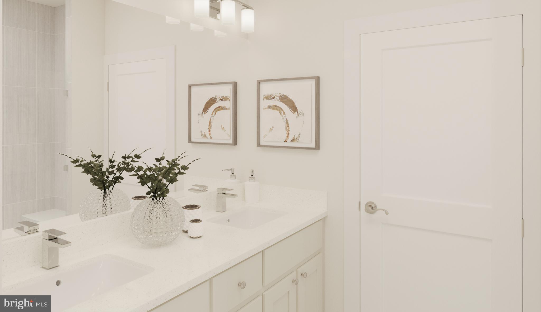1669 Bandit Loop, Unit 305A Reston, VA 20190 - Photo 7 of 30 a bathroom with a sink and mirror