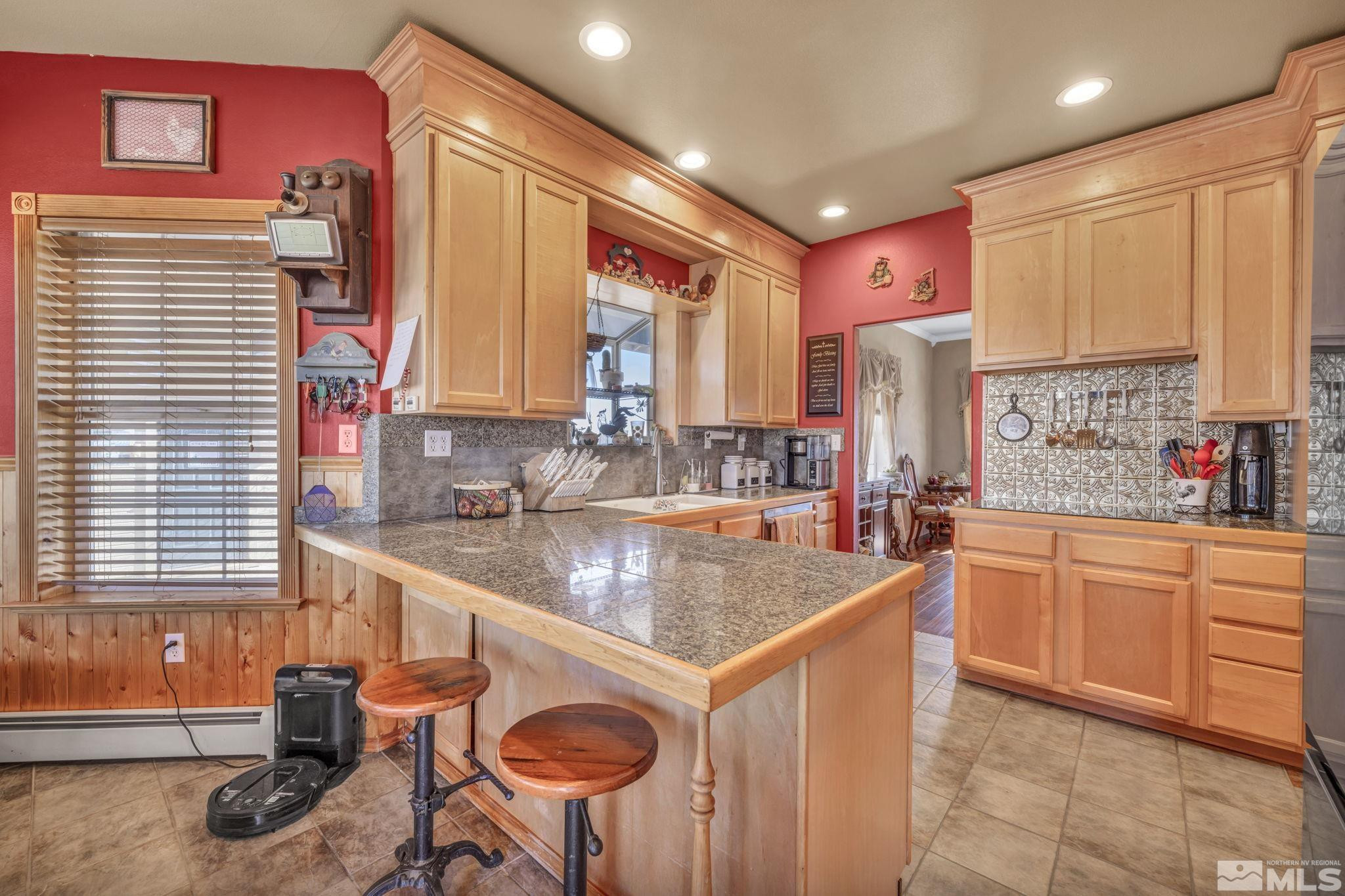 5650 South Allen Road Fallon, NV 89406 - Photo 23 of 40 a large kitchen with a large window