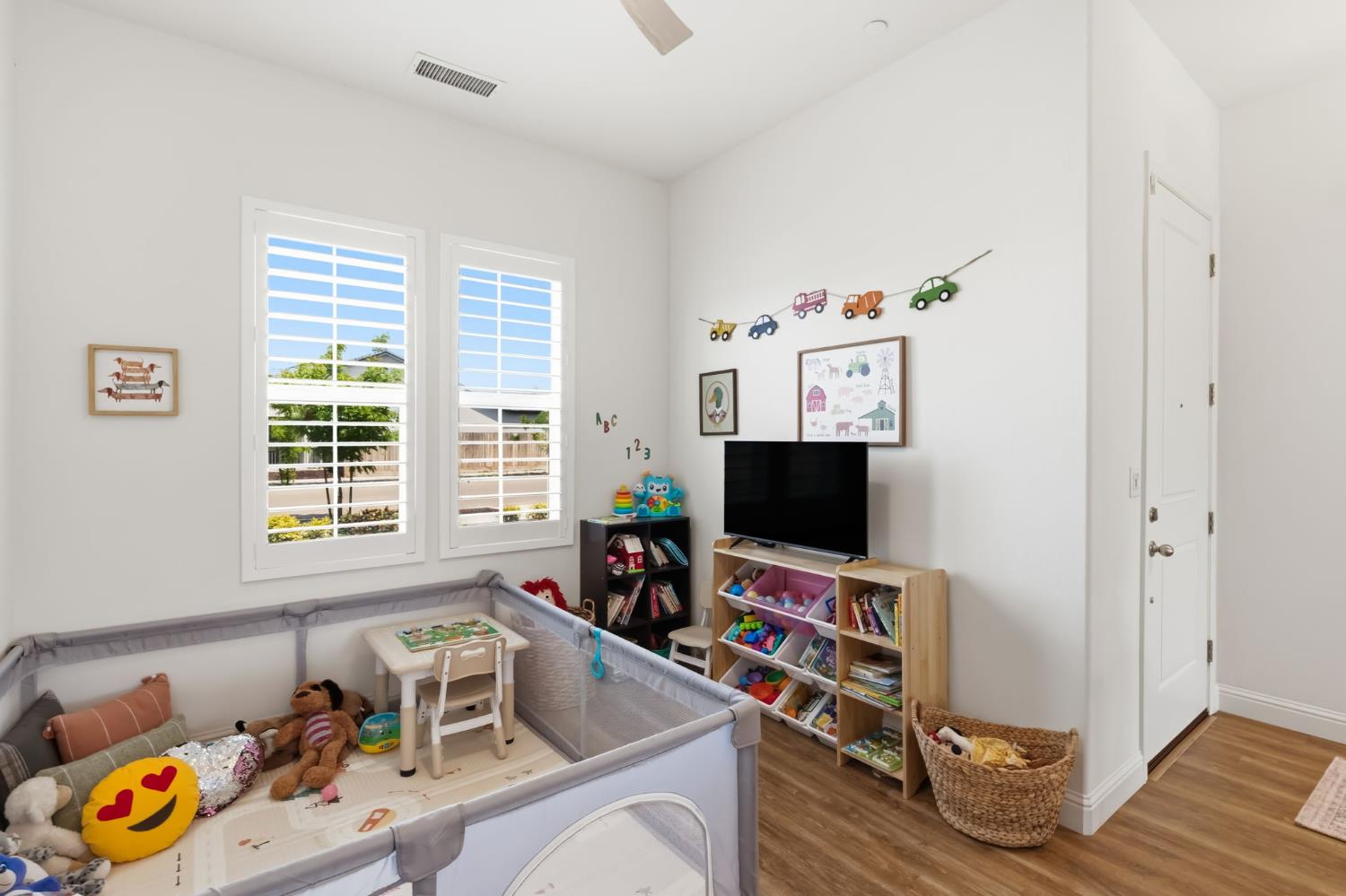 2100 Azalea Street Kingsburg, CA 93631 - Photo 11 of 54 a room with furniture and a flat screen tv