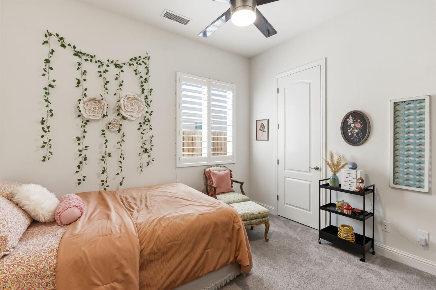 2100 Azalea Street Kingsburg, CA 93631 - Photo 25 of 54 a bedroom with a bed and a window