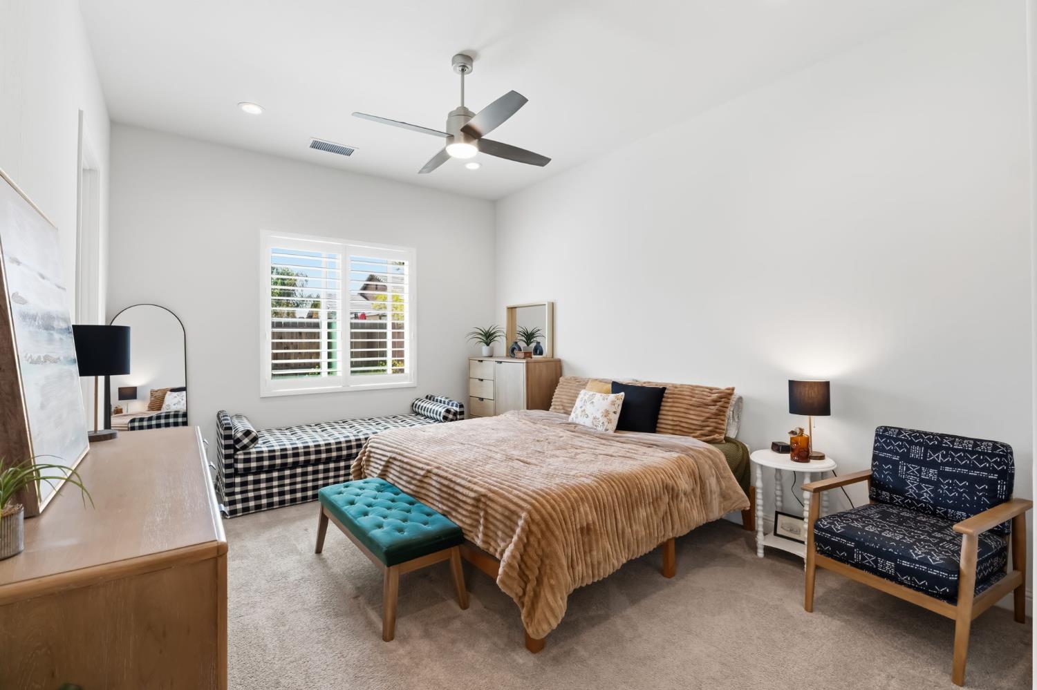2100 Azalea Street Kingsburg, CA 93631 - Photo 27 of 54 a bedroom with a bed furniture and a window