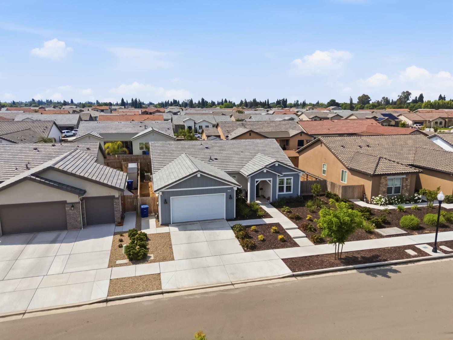 2100 Azalea Street Kingsburg, CA 93631 - Photo 39 of 54 an aerial view of a house with a garden and plants