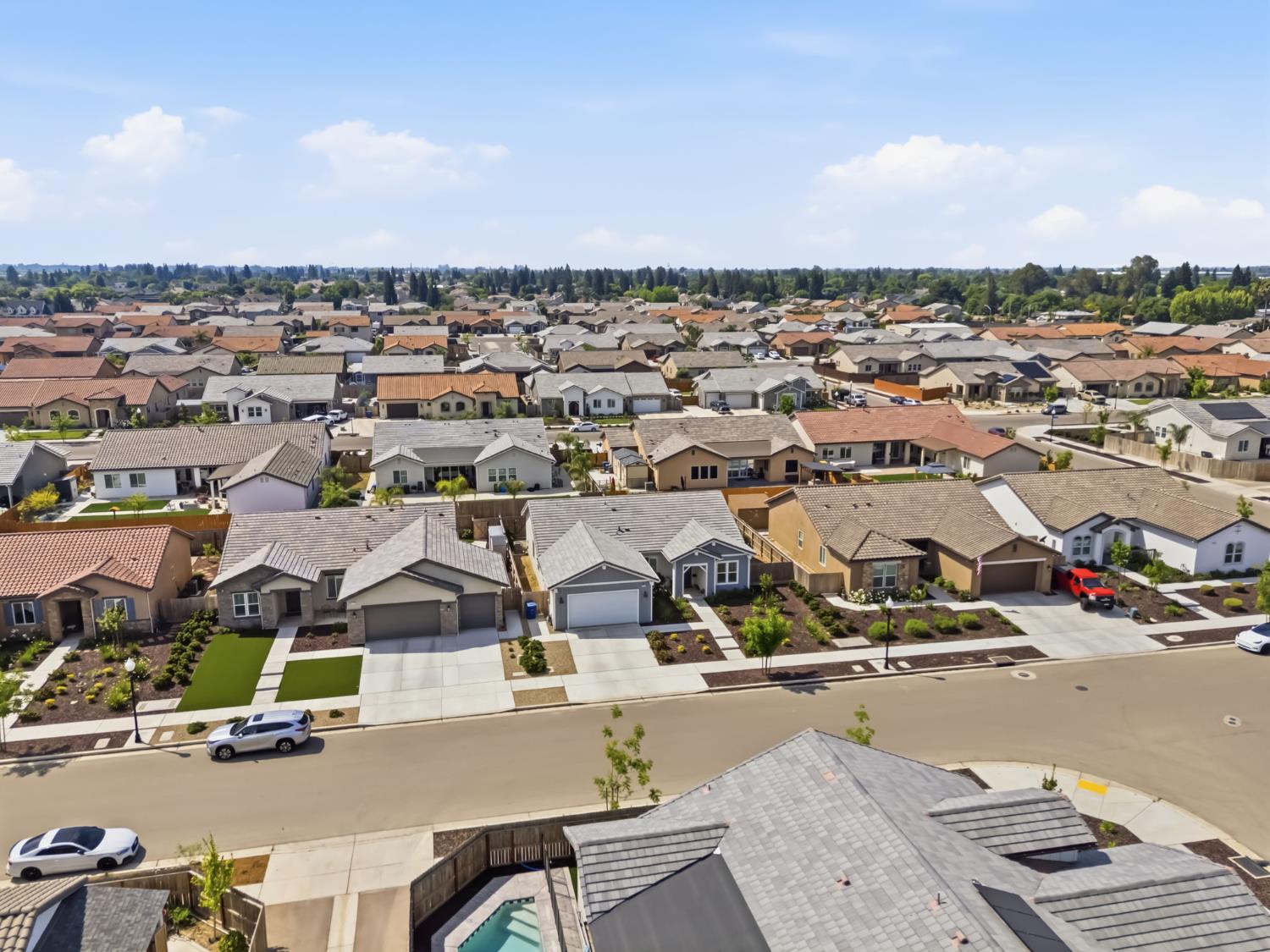 2100 Azalea Street Kingsburg, CA 93631 - Photo 40 of 54 an aerial view of residential houses with outdoor space