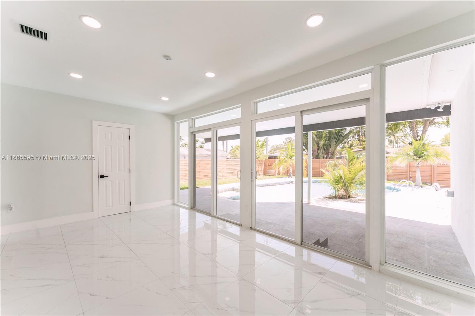 1446 Scott Street Hollywood, FL 33020 - Photo 31 of 47 a view of an empty room and window