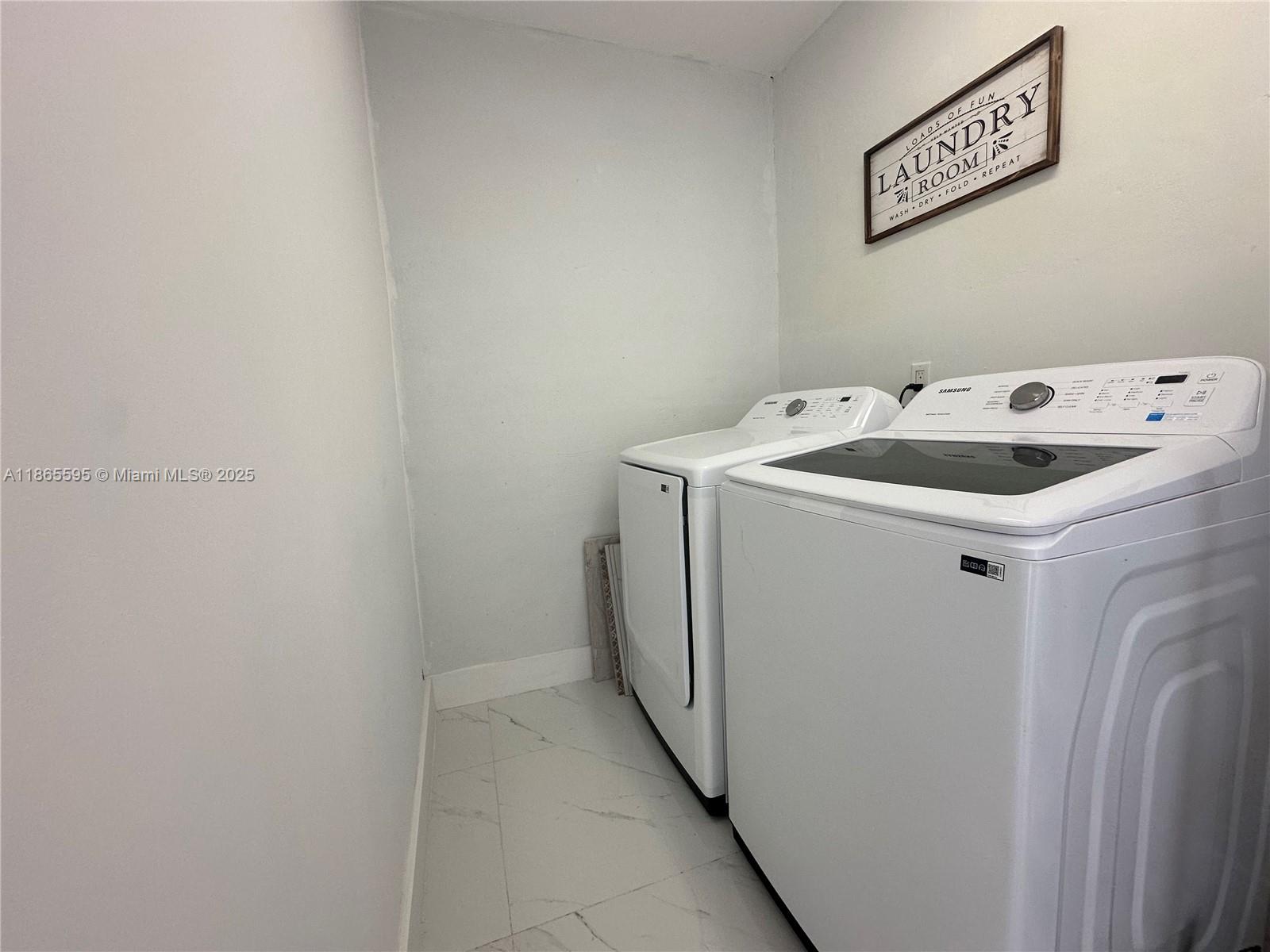 1446 Scott Street Hollywood, FL 33020 - Photo 33 of 47 a utility room with dryer and washer