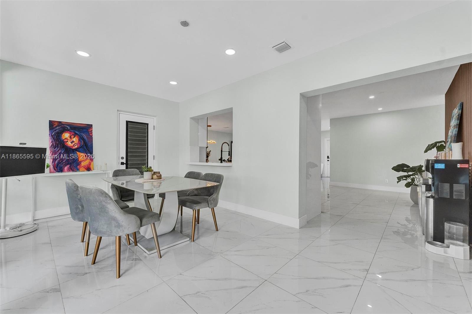 1446 Scott Street Hollywood, FL 33020 - Photo 4 of 47 a view of a dining room with furniture