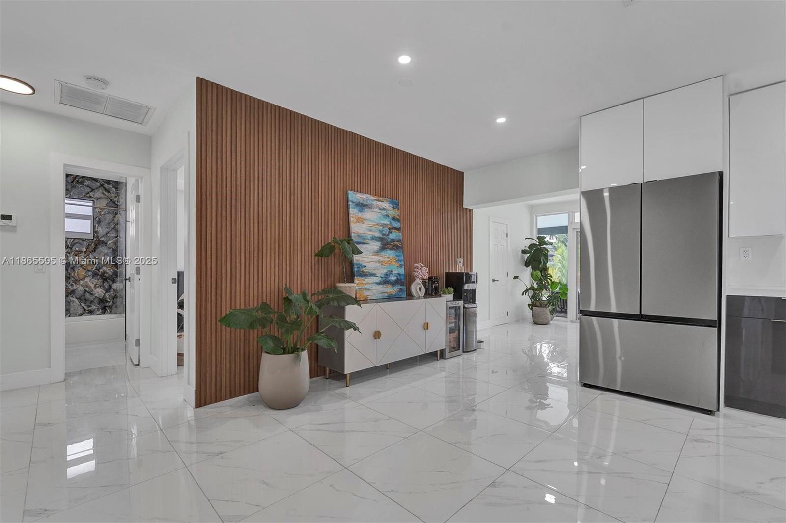 1446 Scott Street Hollywood, FL 33020 - Photo 7 of 47 a kitchen with a refrigerator and a sink
