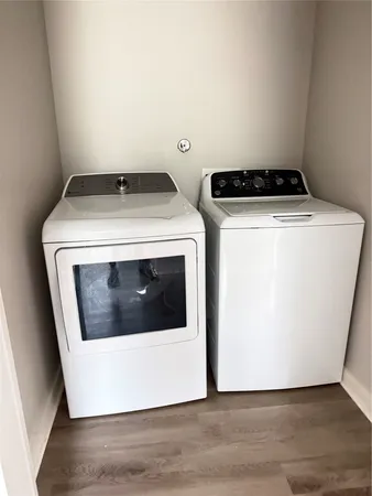 a utility room with dryer and washer