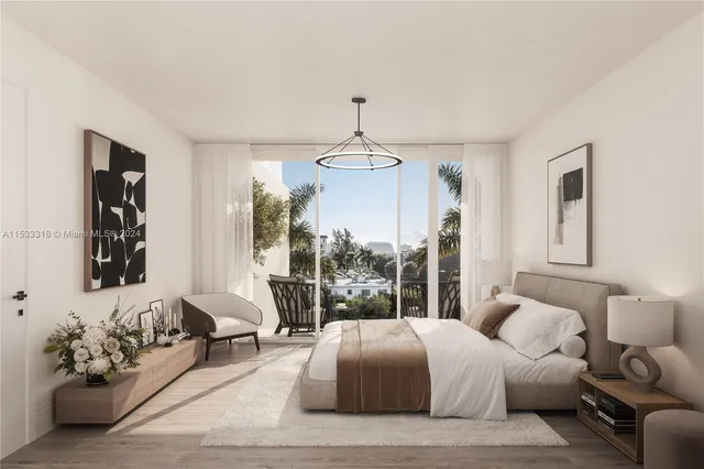 a bedroom with a bed couch and window