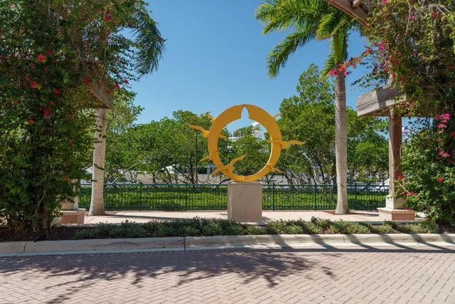 a view of a pool with a yard potted plants