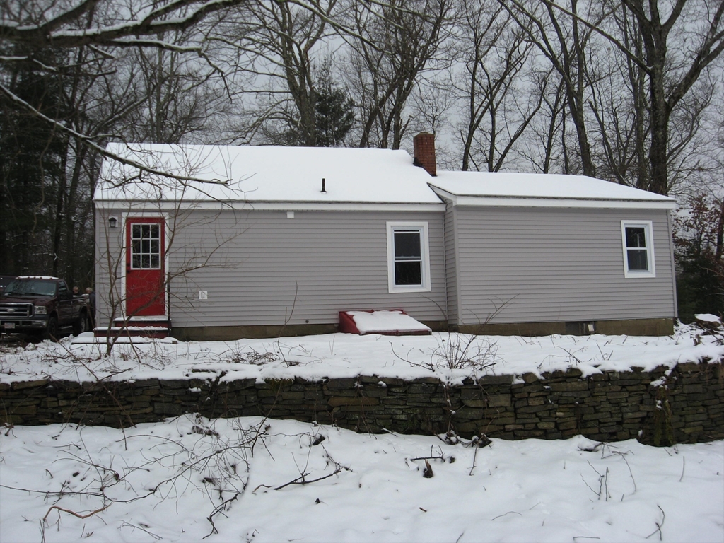 160 Peterson Road Palmer, MA 01069 - Photo 4 of 24 a view of a back yard of the house
