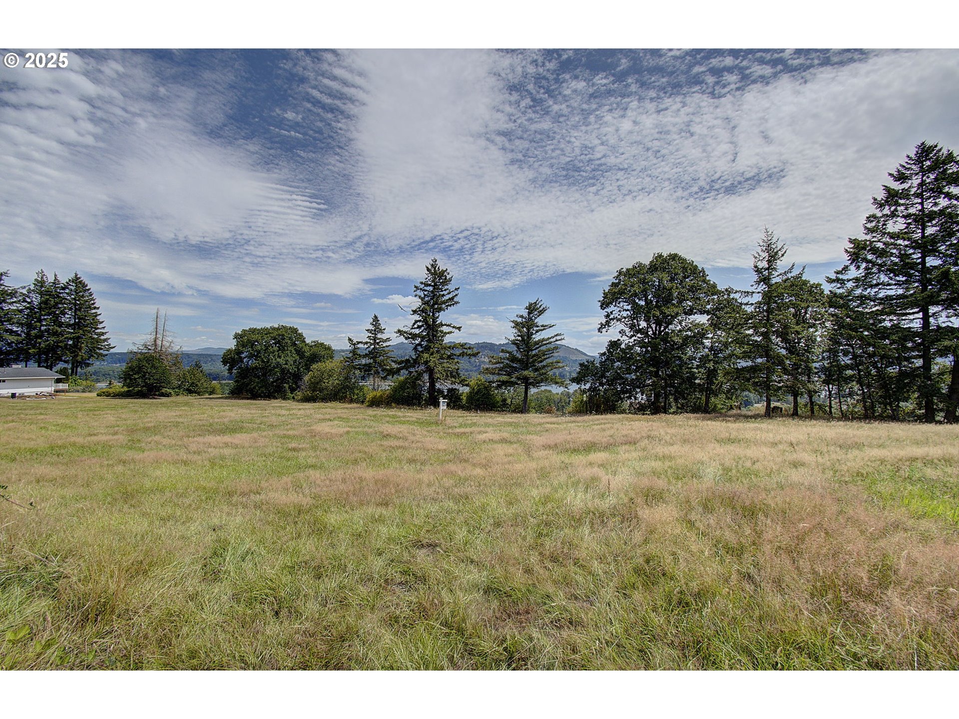 Little Jack Falls Road Rainier, OR 97048 - Photo 9 of 12 a view of a field of grass and trees