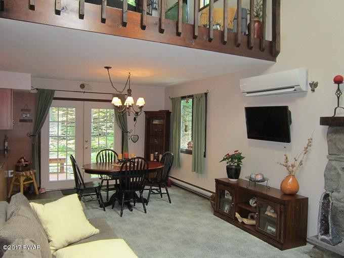195 Pebble Rock Road Lackawaxen, PA 18435 - Photo 9 of 47 9 LIVING ROOM TO DINNING IMG_5318
