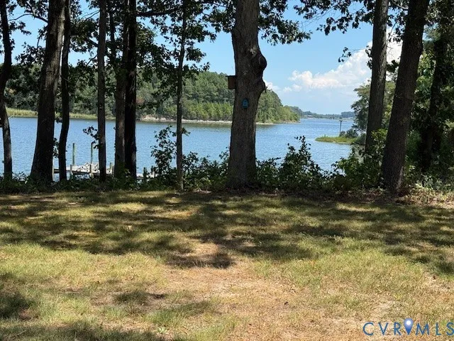 a view of a backyard of the house