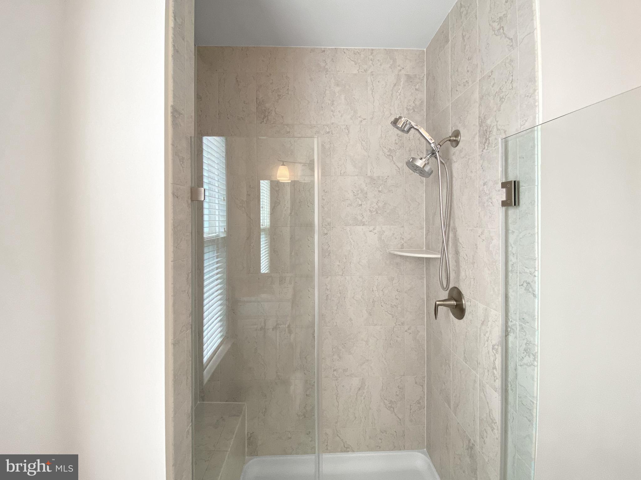 4967 Lakeside Crossing Chantilly, VA 20151 - Photo 27 of 45 a bathroom with a shower