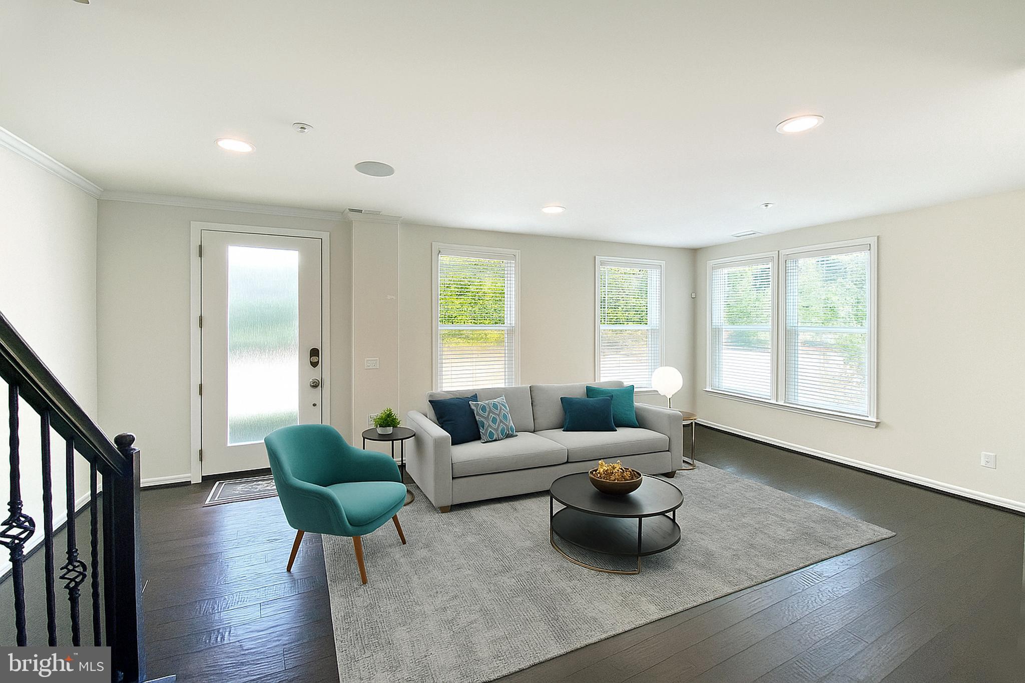 4967 Lakeside Crossing Chantilly, VA 20151 - Photo 38 of 45 a living room with furniture and a window