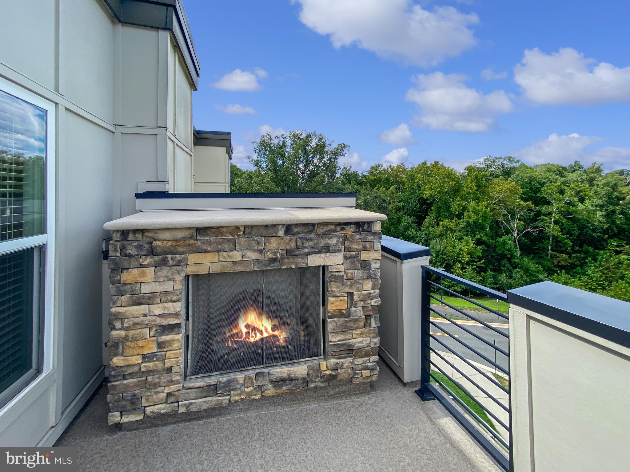4967 Lakeside Crossing Chantilly, VA 20151 - Photo 6 of 45 a view of a fireplace sitting in a room